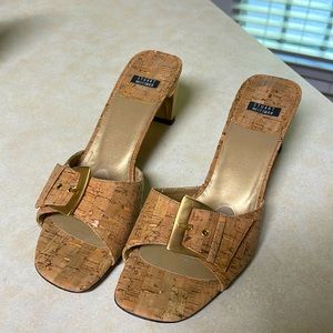 Stuart Weitzman Cork pop sandals with gold accent.